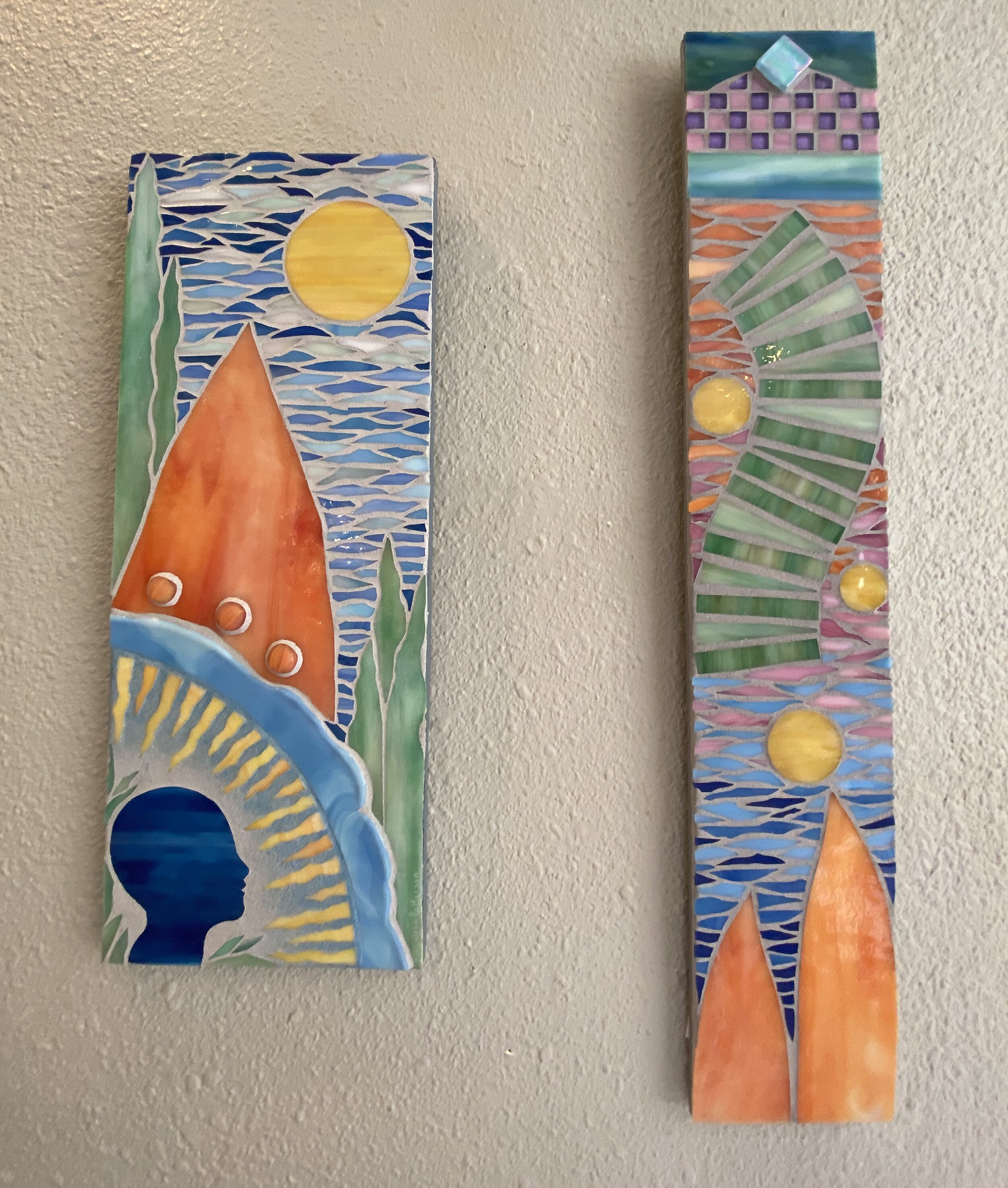 Glass Mosaics, left to right: "Sugar Mountain"  7 x 18", $265  /  "Three Suns" 4.5 x 24" $235