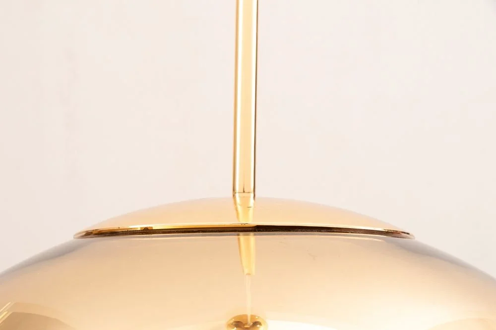 tom-dixon-golden-globe-pendant-light_14_38794d.jpg