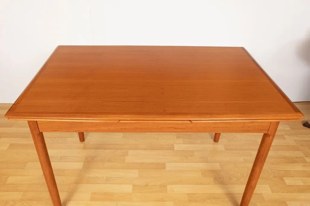 midcentury-teak-extending-dining-table-by-niels-otto-m_ller_14_48769b.webp