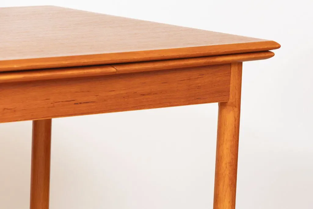 midcentury-teak-extending-dining-table-by-niels-otto-m_ller_14_48769d.webp