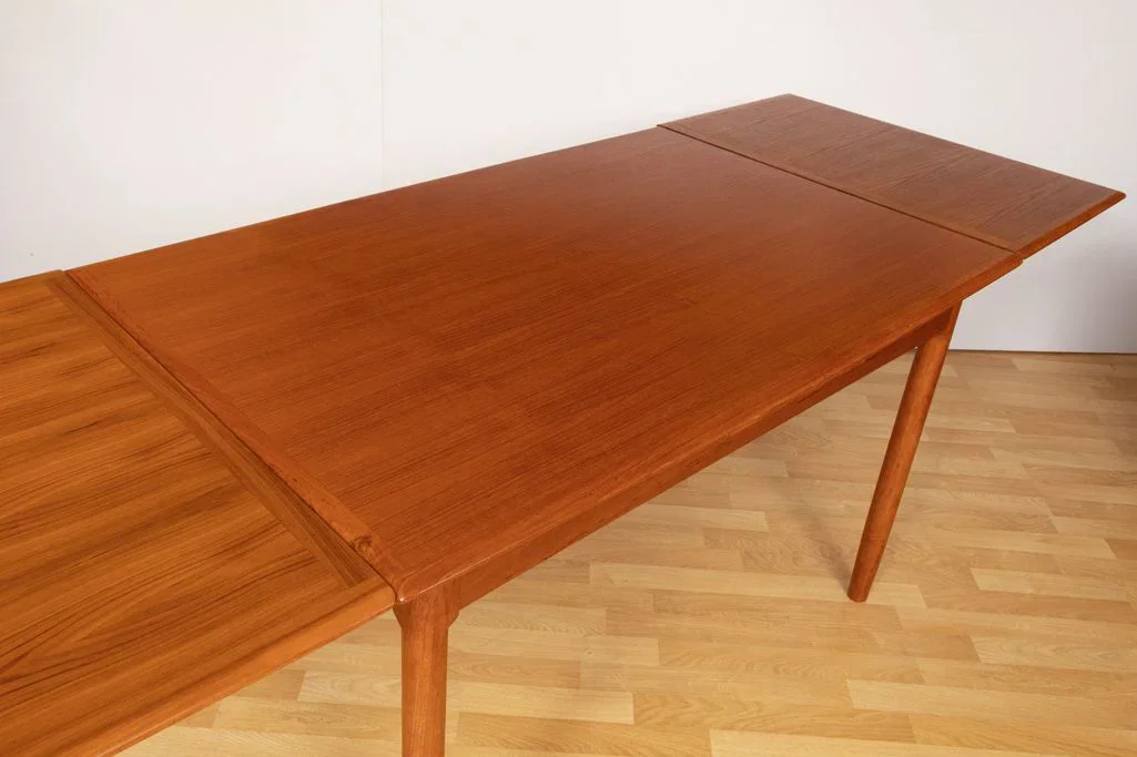 midcentury-teak-extending-dining-table-by-niels-otto-m_ller_14_48769i.webp