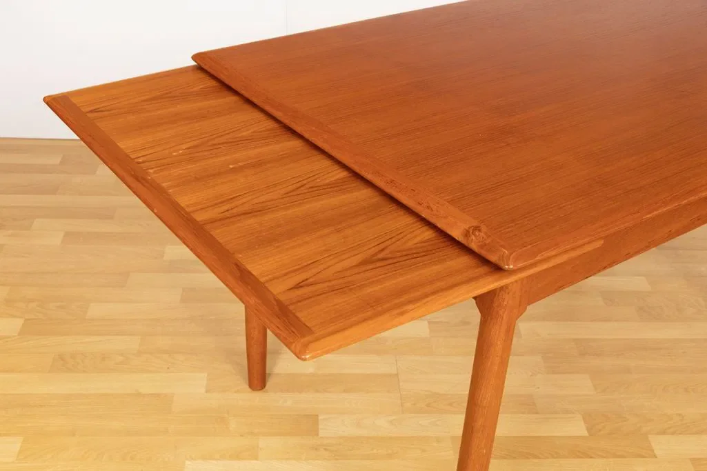 midcentury-teak-extending-dining-table-by-niels-otto-m_ller_14_48769g.webp