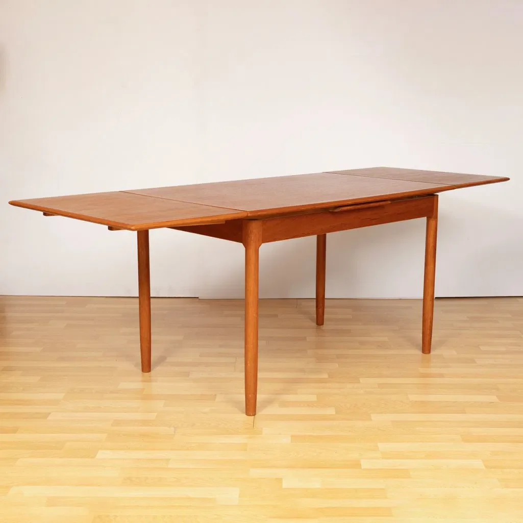midcentury-teak-extending-dining-table-by-niels-otto-m_ller_14_48769h.webp