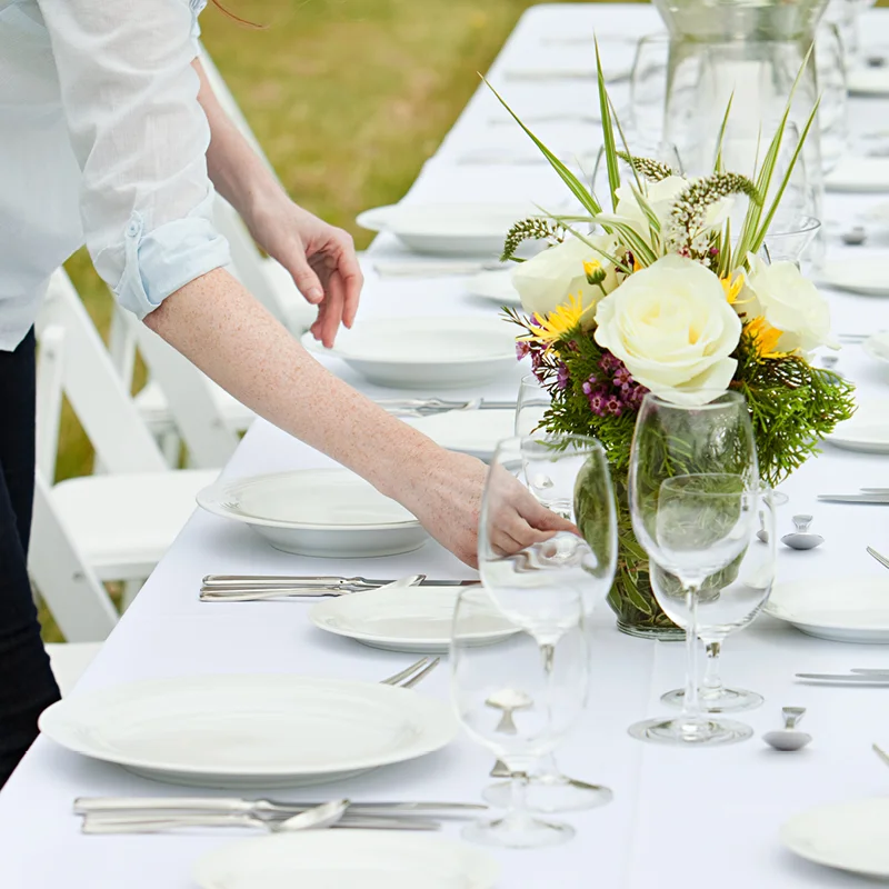 Wedding Planner setting up for a reception.jpg