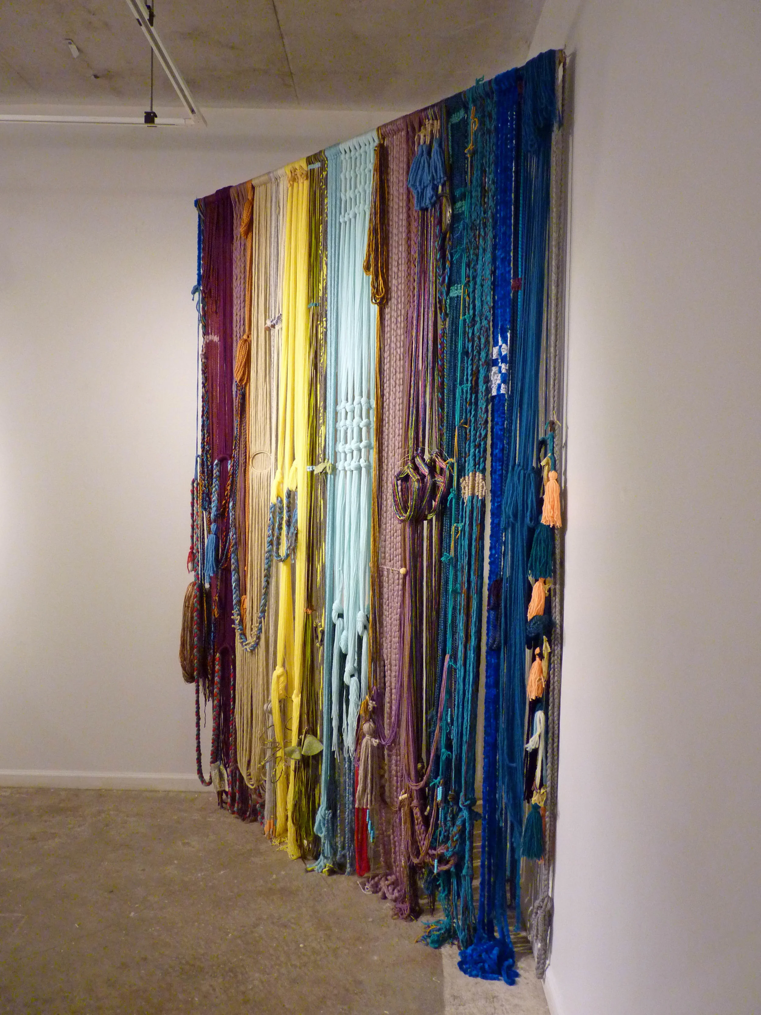 Teen Baleen (Corset), 2015, Yarn with fabric, wood and metal, 7' x 4' x 11'