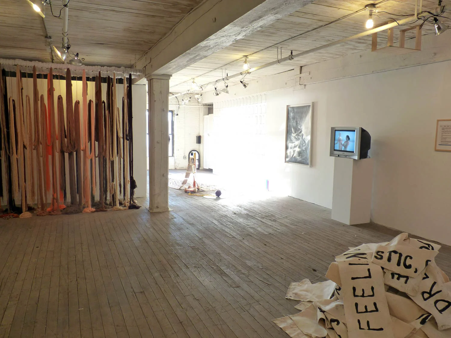 A Valence, 2012, Yarn, wood, poly-fil and hardware, 10 x 2 x 10 feet (Installation view)