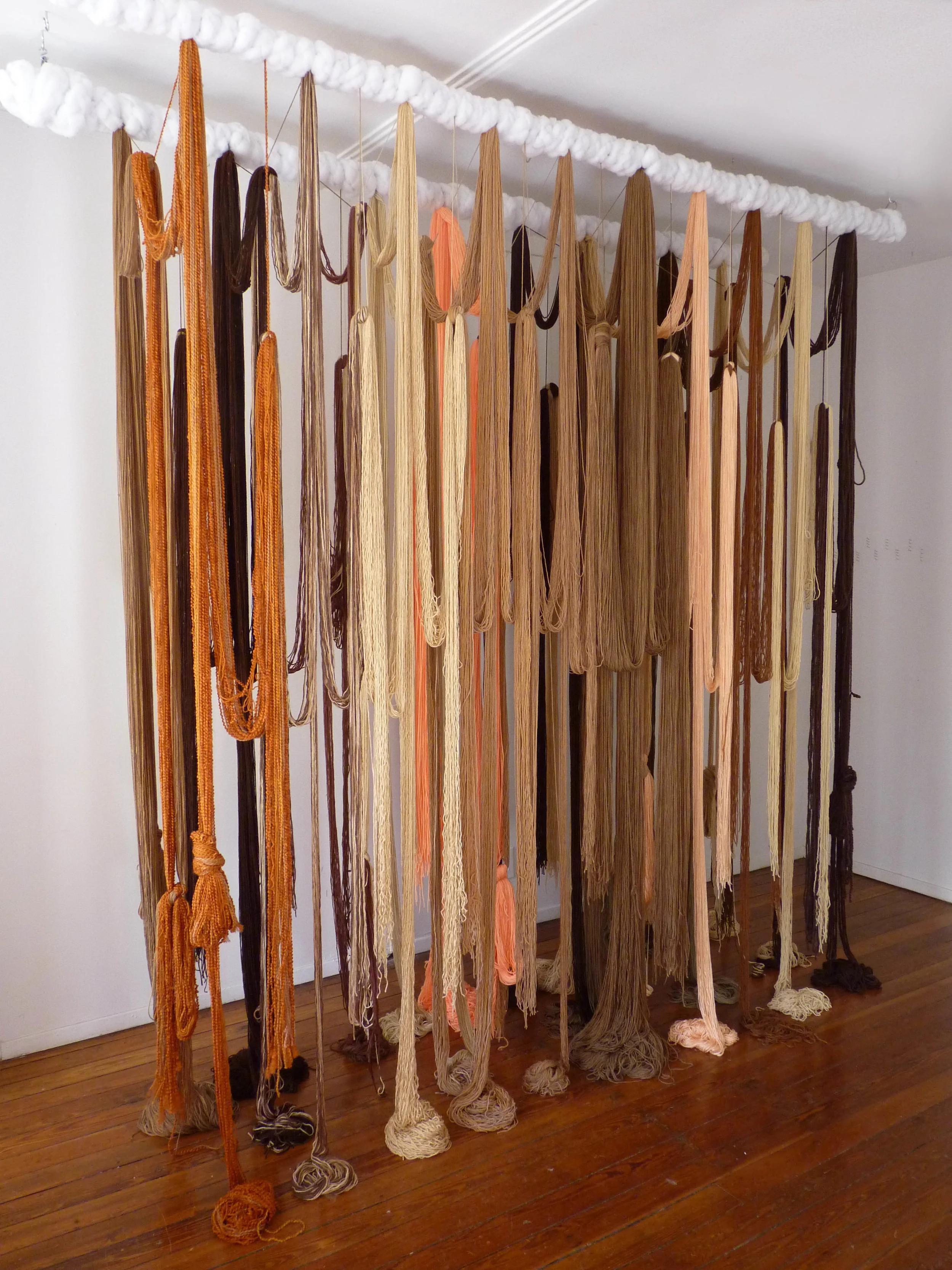 A Valence, 2012, Yarn, wood, poly-fil and hardware, 10 x 2 x 10 feet (Studio view)