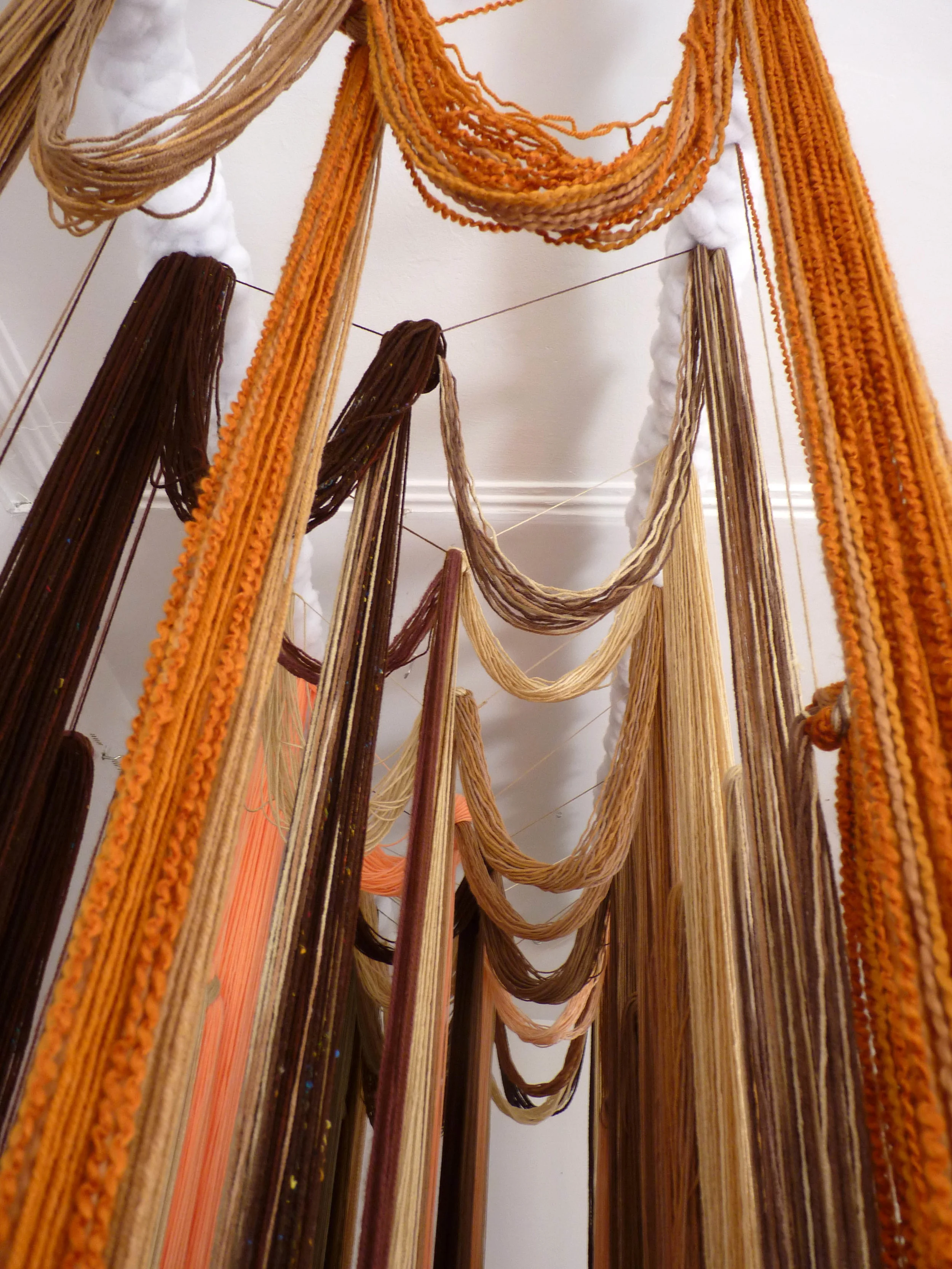 A Valence, 2012, Yarn, wood, poly-fil and hardware, 10 x 2 x 10 feet (Studio view detail)