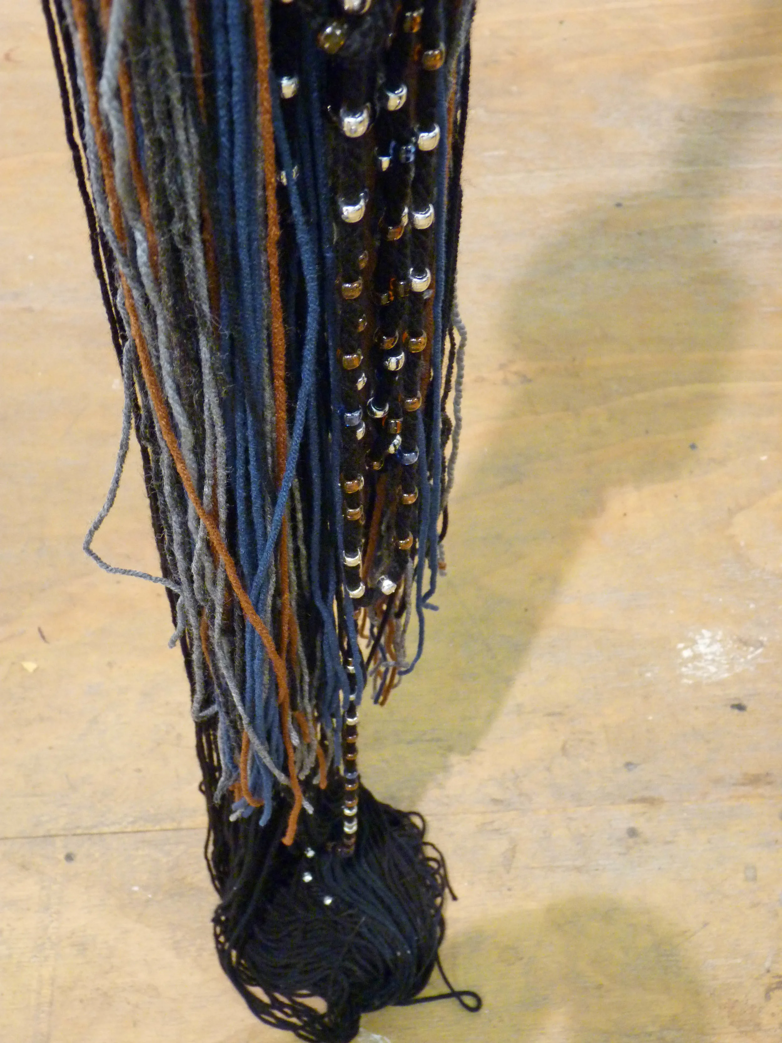 Rico Gatson and Ellie Murphy Untitled, 2010, Gaffers tape, inkjet prints, Acrylic and wool yarn, plastic pony beads, monofilament fishing line, 3' x 11' x 3' (Detail from Collective Show)