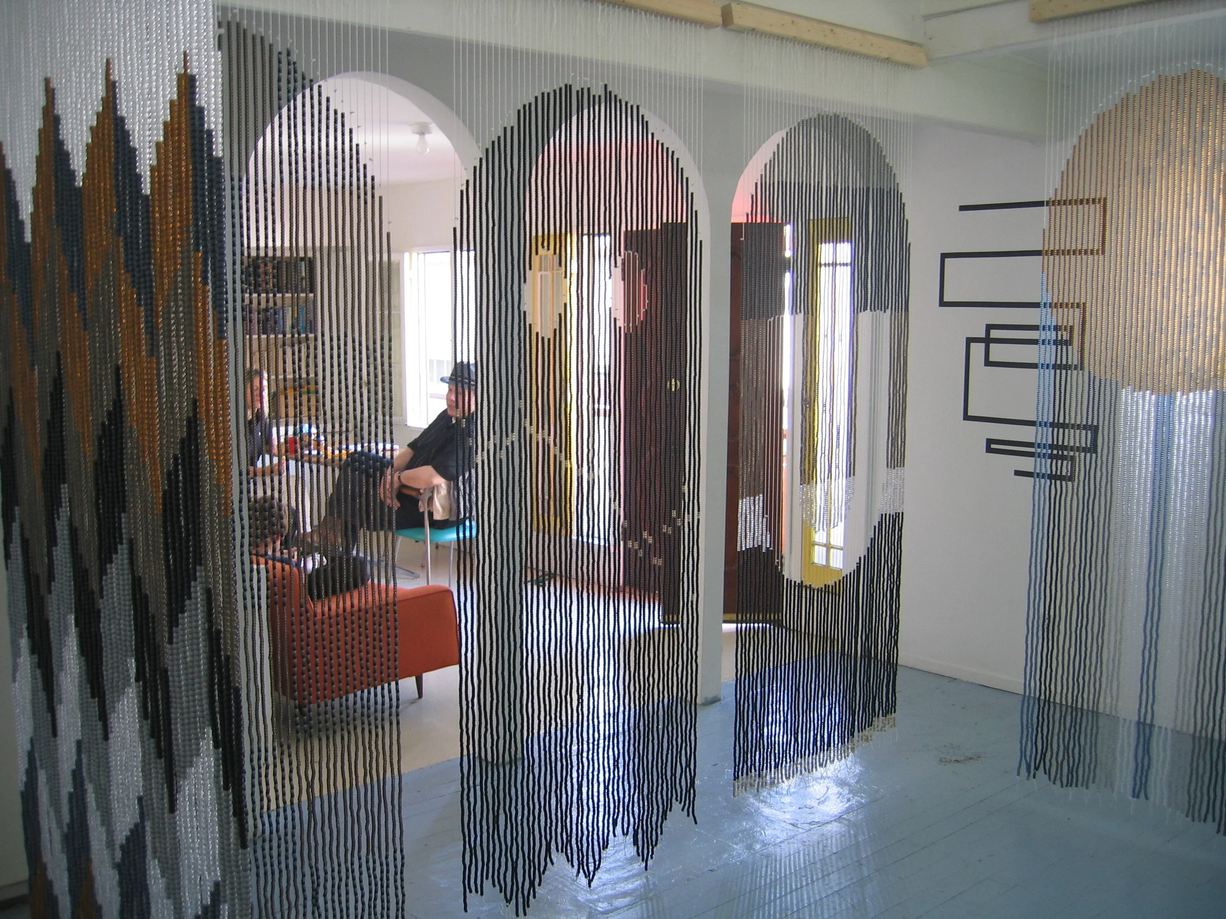 Rico Gatson and Ellie Murphy, Pac Man at ACP, 2009, Beads, nylon, wood, hardware, Gaffers tape, paper, paint, pencil, glitter and images, 5 curtains, each 30 x 80" (Installation dimensions variable)