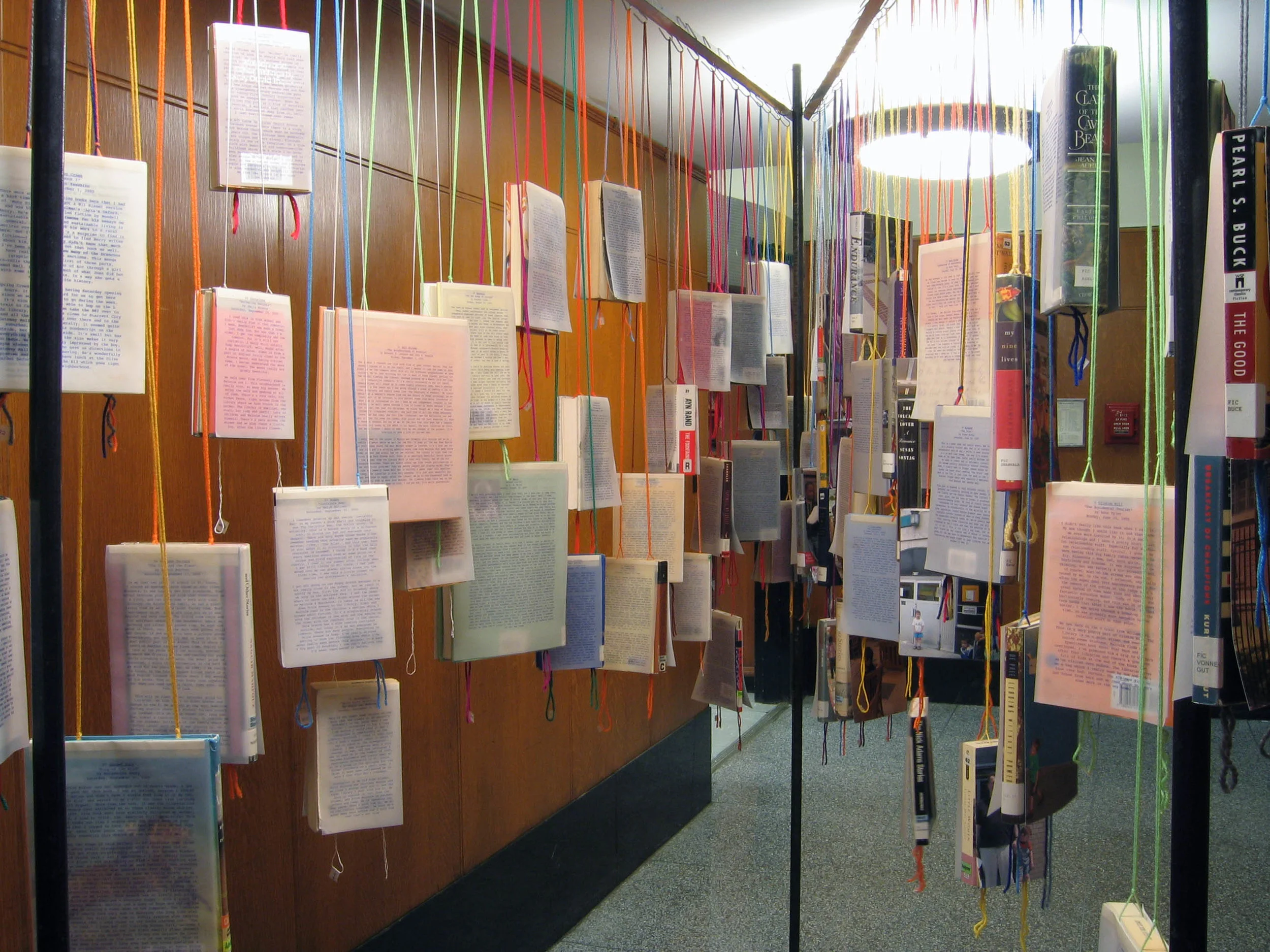 bioGRAPHY: A Site Specific Project for the Brooklyn Public Library, 2005, 60 library books, paper, photo, yarn, tape and metal, 7 x 4 x 11 feet (Detail)