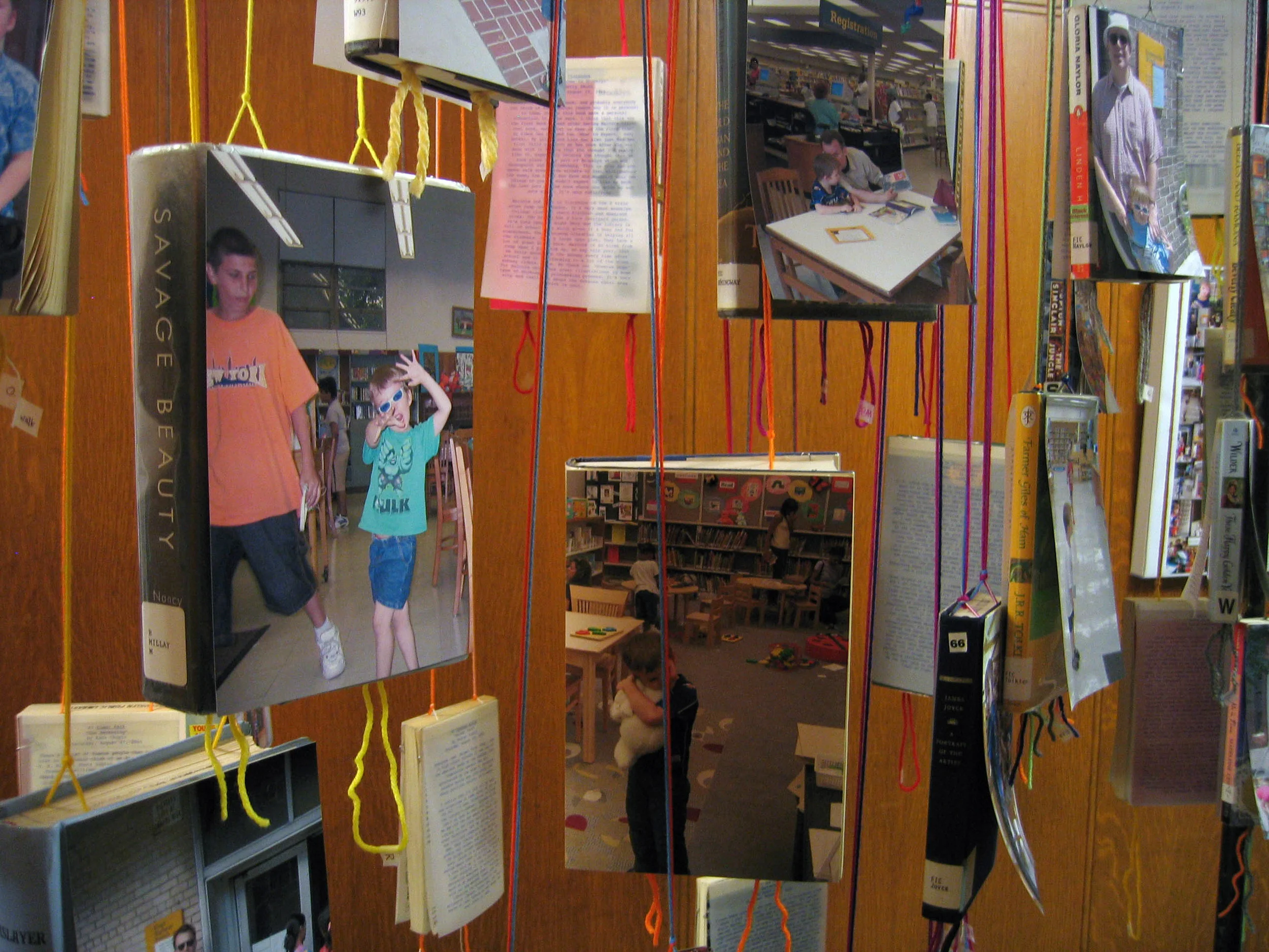 bioGRAPHY: A Site Specific Project for the Brooklyn Public Library, 2005, 60 library books, paper, photo, yarn, tape and metal, 7 x 4 x 11' (Detail)
