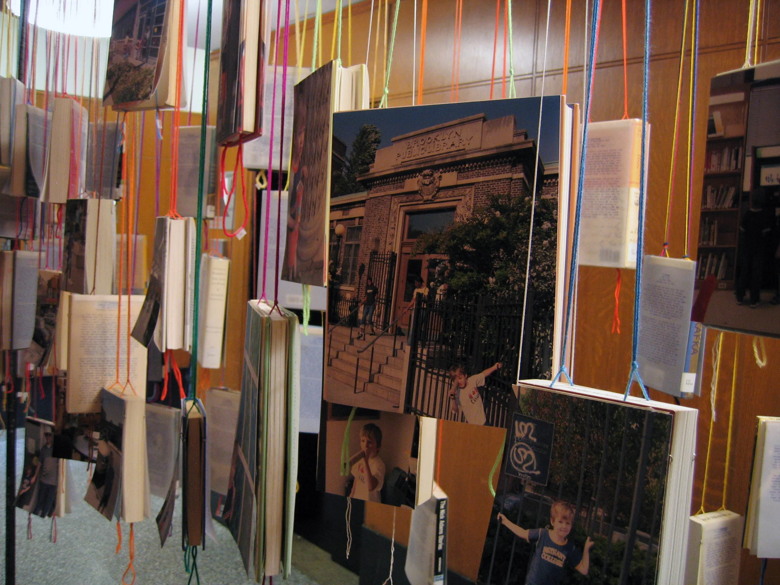 bioGRAPHY: A Site Specific Project for the Brooklyn Public Library, 2005, 60 library books, paper, photo, yarn, tape and metal, 7 x 4 x 11' (Detail)