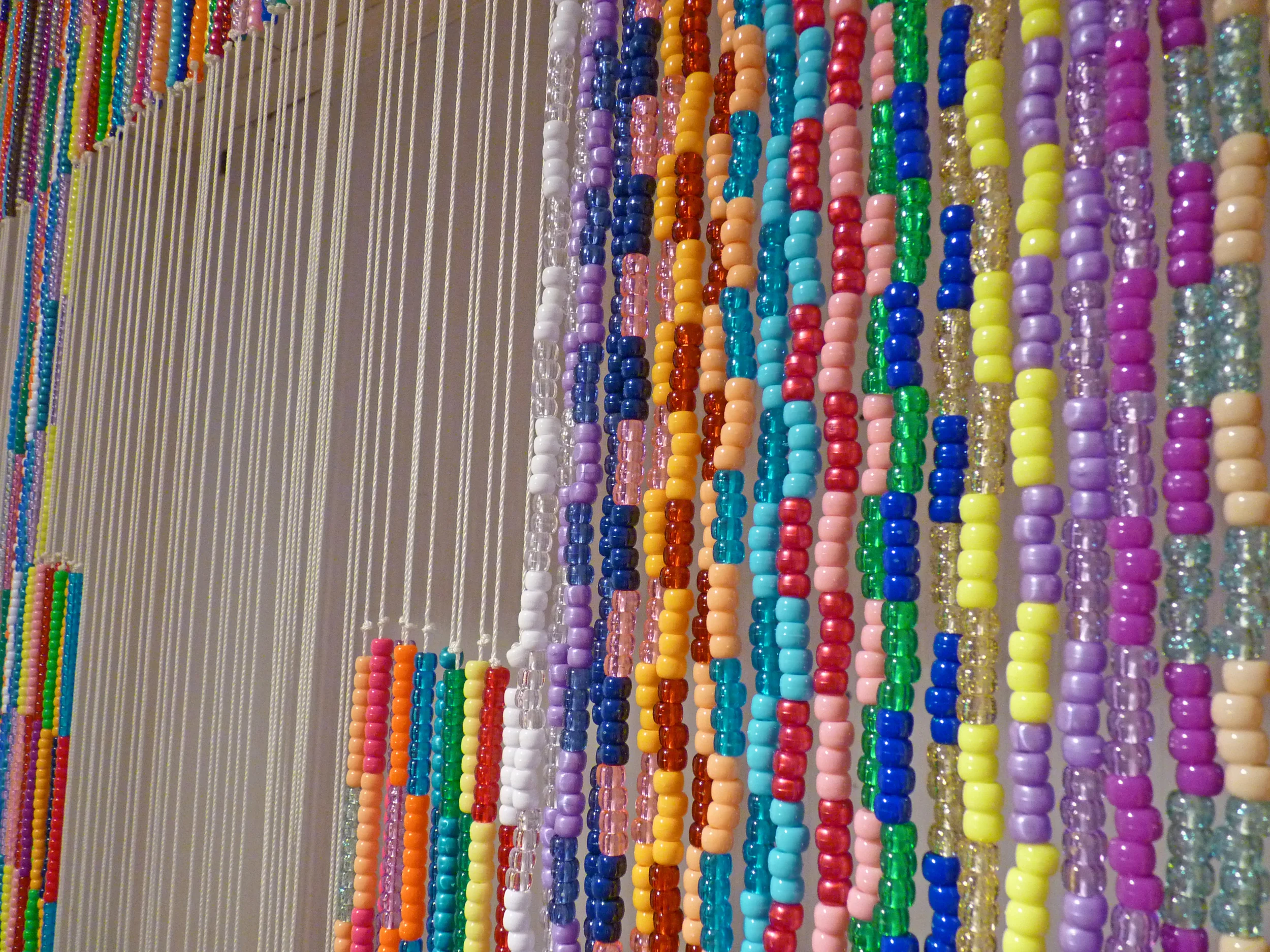 Untitled (The Big "U"), 2009 Plastic beads, nylon, metal and wood, 6' x 8' (Detail)