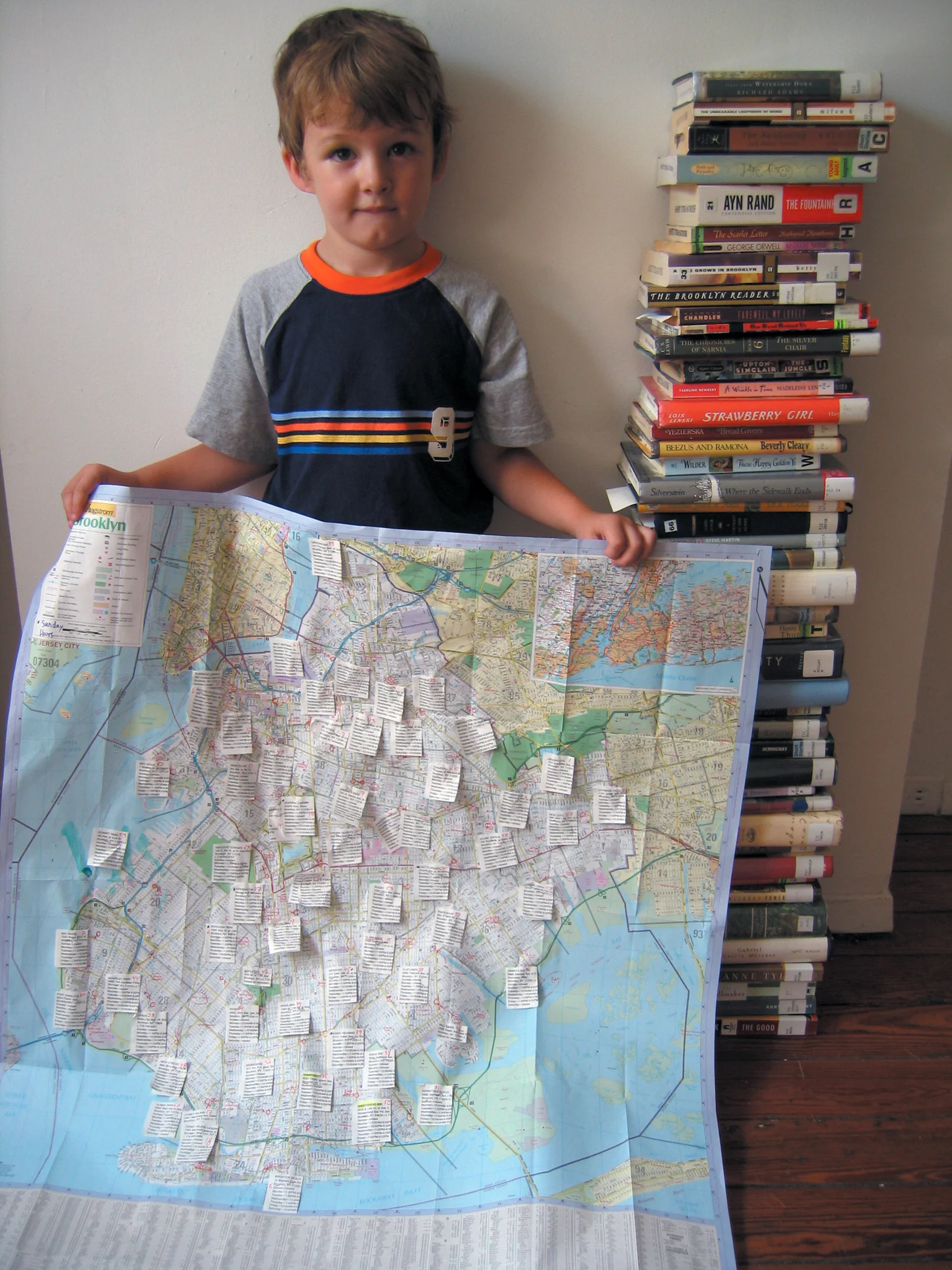 bioGRAPHY: A Site Specific Project for the Brooklyn Public Library, 2005, 60 library books, paper, photo, yarn, tape and metal, 7 x 4 x 11' (Work in progress in studio)