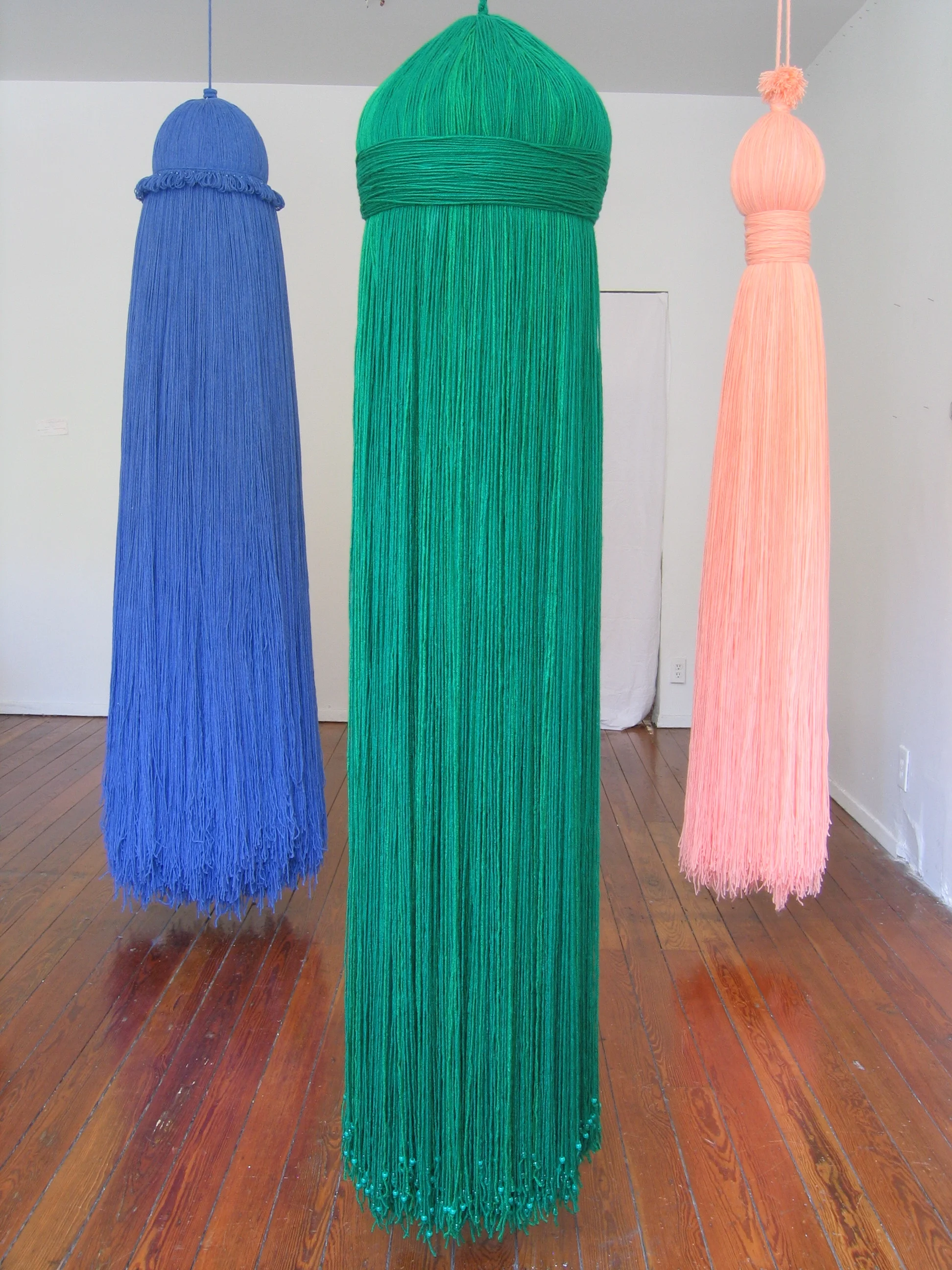 Tassels, 2006, Acrylic yarn and beads with nylon rope, 3 pieces each around 1.5' x 7'