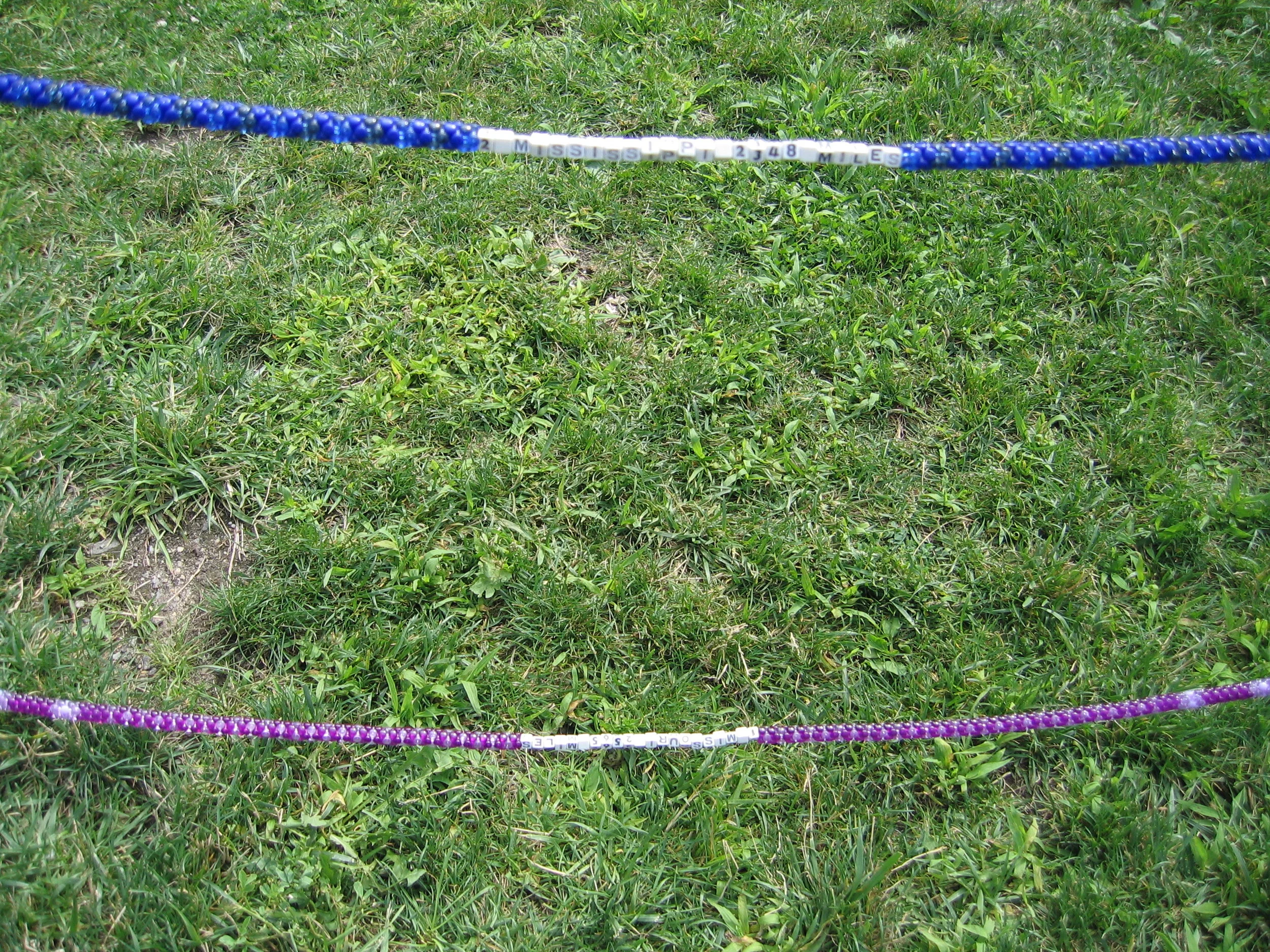 River Abacus, 2004, Fiberglass, nylon, plastic beads and cement, 16 x 20' (Detail)