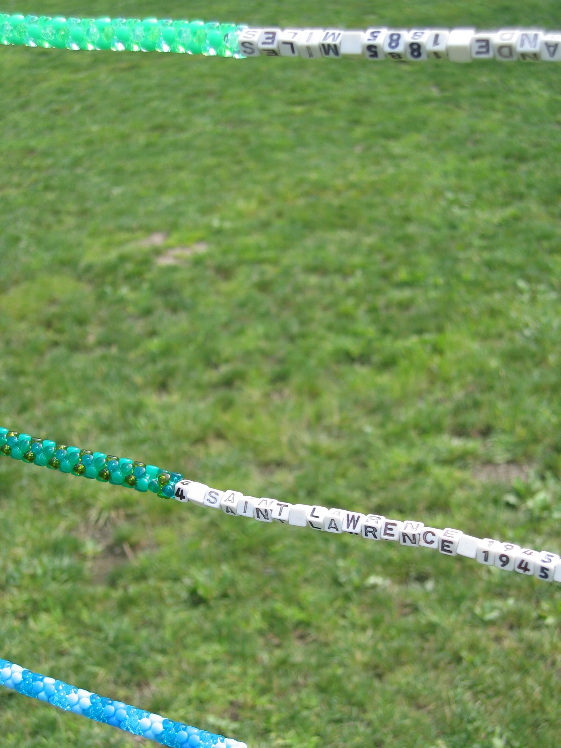 River Abacus, 2004, Fiberglass, nylon, plastic beads and cement, 16 x 20' (Detail)