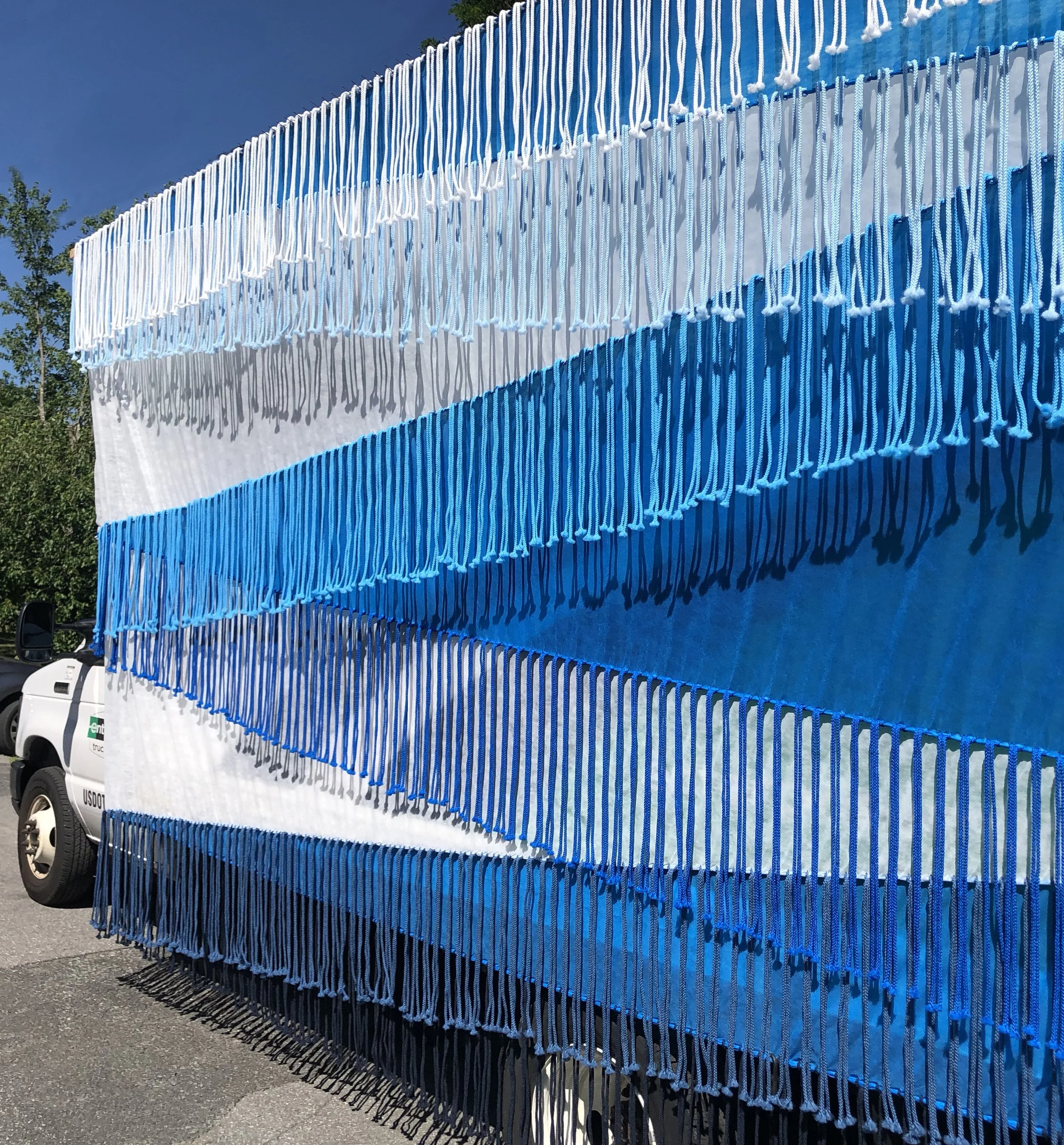 Blue Moves, 2022, Non-Woven Fabric, 6mm Macrame Cord, Wood and Nails, 16 feet x 10 feet, Installation “Color Wheels: Upstate Arts Weekend,” Kerhonkson, NY
