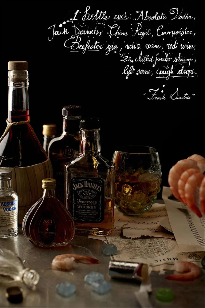 Frank Sinatra - 1 bottle each: Absolute, Jack Daniels, Chivas Regal, Courvoisier, Beefeater gin, white wine, red wine, 24 chilled jumbo shrimp, life savers, cough drops