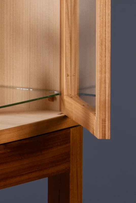   The glass is pinned in with brass pins instead of glue or silicone to allow for easy replacement, if ever needed.  