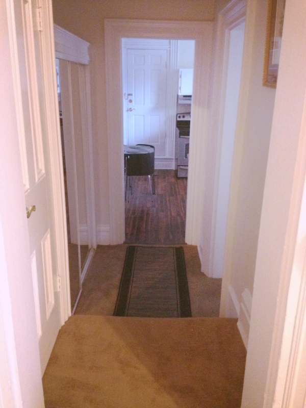 Hallway to Bathroom and Full Kitchen