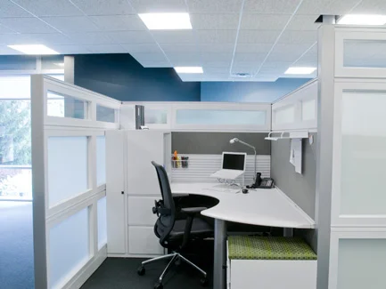 Xsite glazed panels to floor with Footprint surfaces and Hero chair