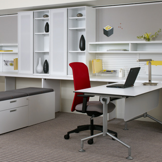    Workstation with Fluent storage, Footprint worksurfaces, Scenario table, Traxx and Tile wall system, and Campos seating 