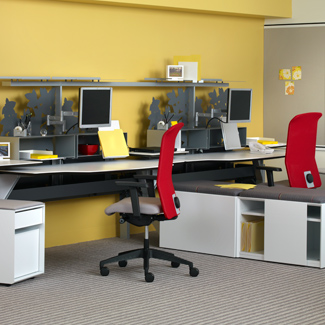    Team work area with Hum. Minds at Work desk and storage, Fluent storage, and Campos seating 