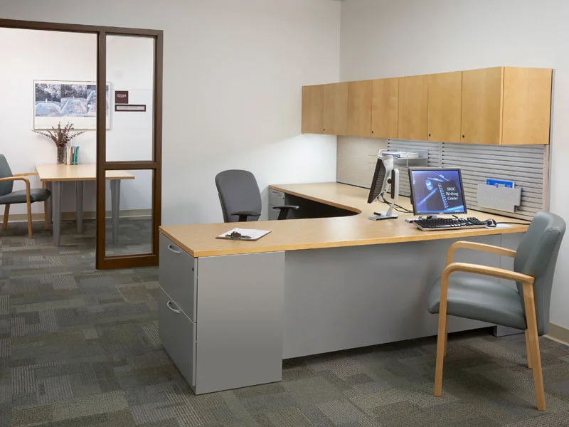 Private office with Footprint worksurfaces and storage, Wish task seating, and Stature guest seating