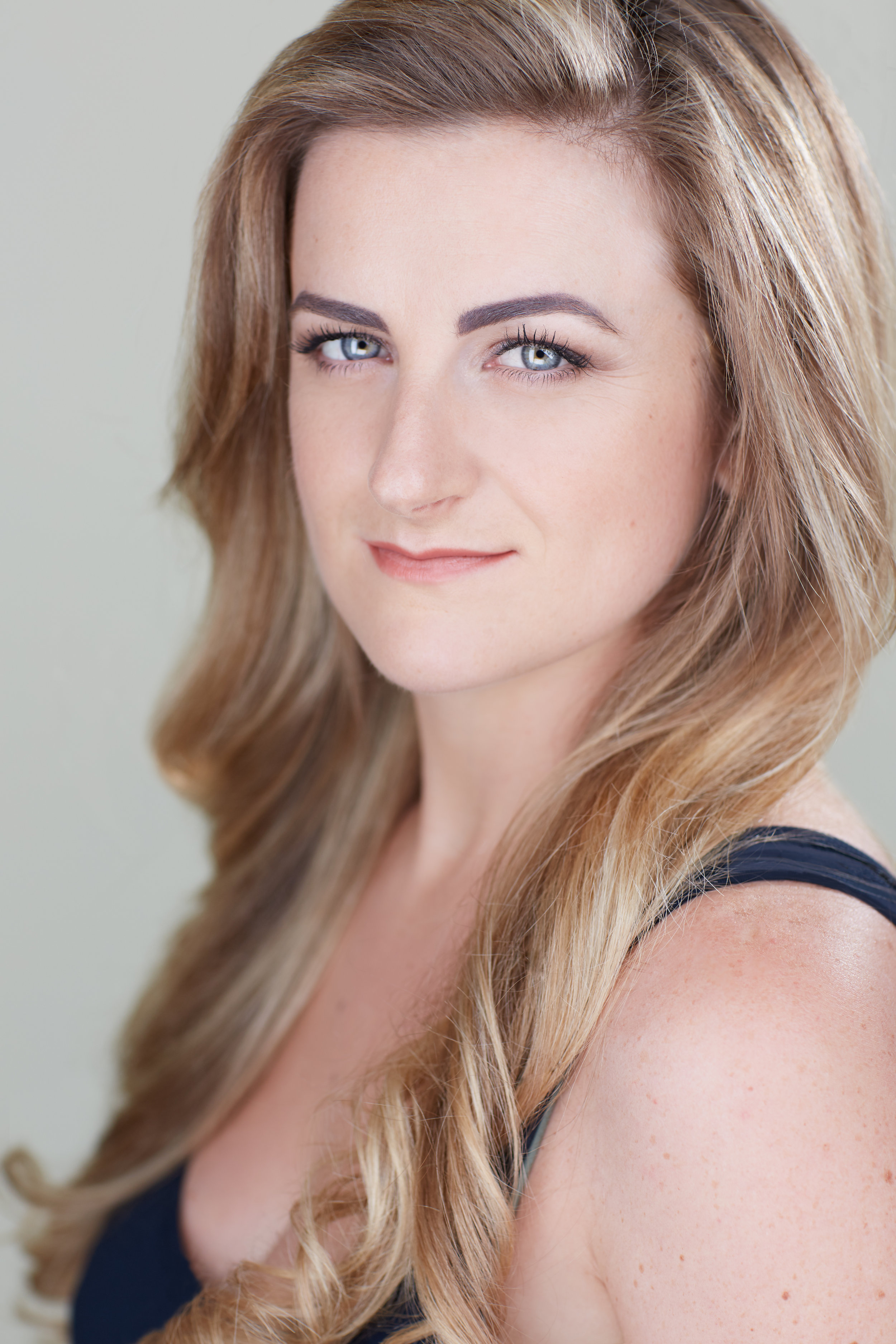 Headshot by Jess Osber.