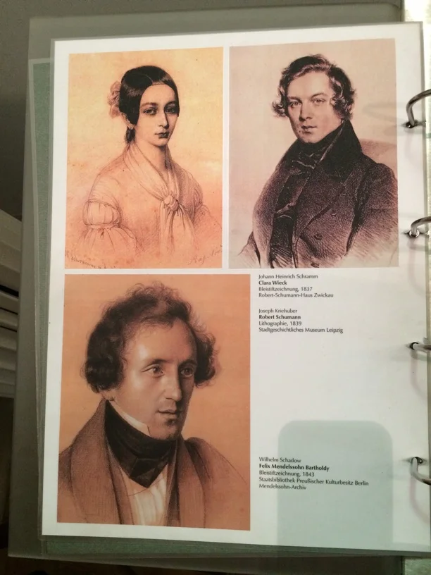 Portraits of Clara and Robert, with Mendelssohn below