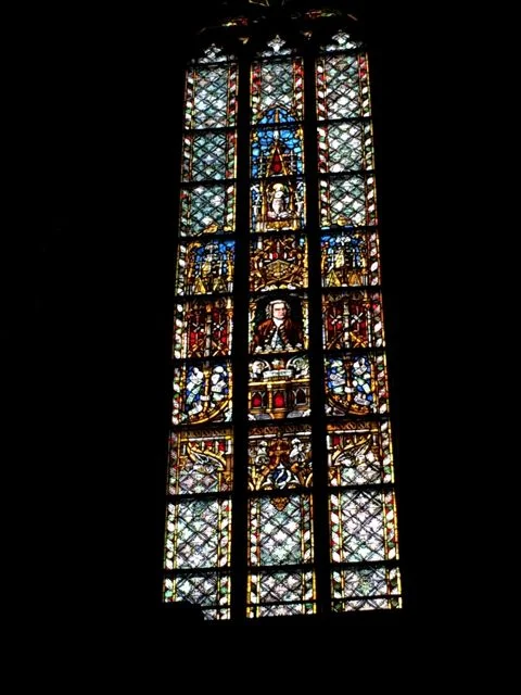 The stained glass window featuring JSB