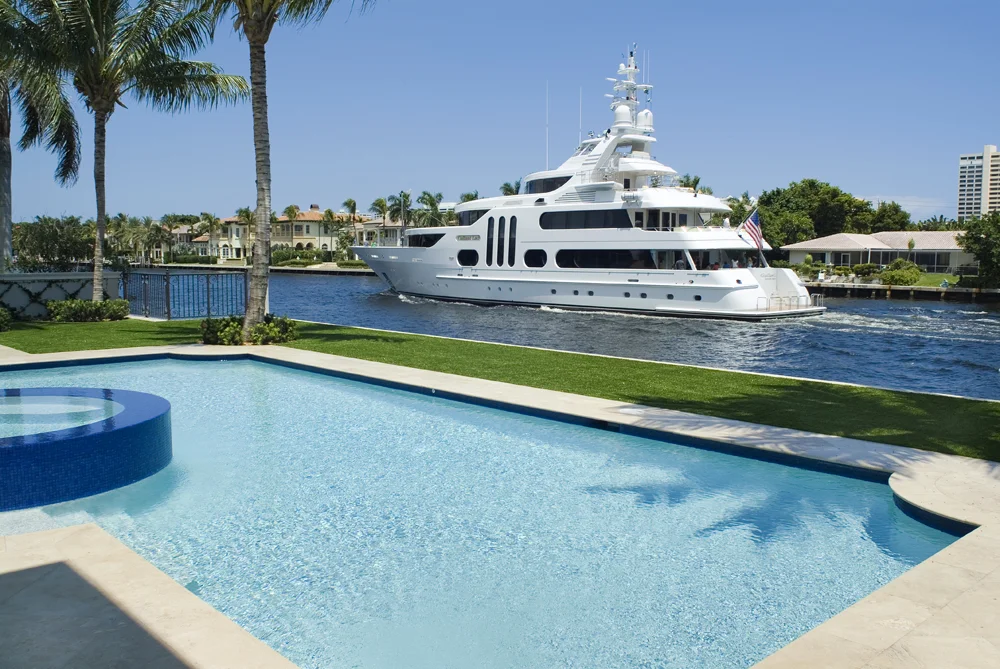 Pool with mega yacht