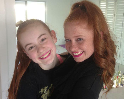 Ashi (left) with older sister Dani.