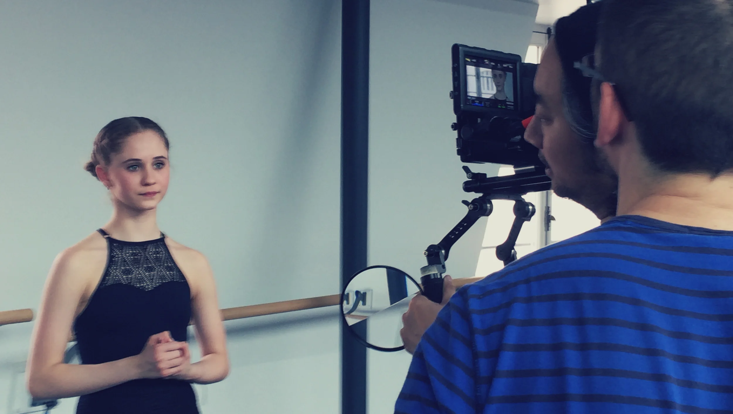 Above: David ready to shoot a close-up - Below Right: Richard busts a move with Bianca between takes