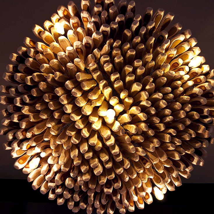 The view from underneath one of our three Pointe Shoe Chandeliers featured in the store!