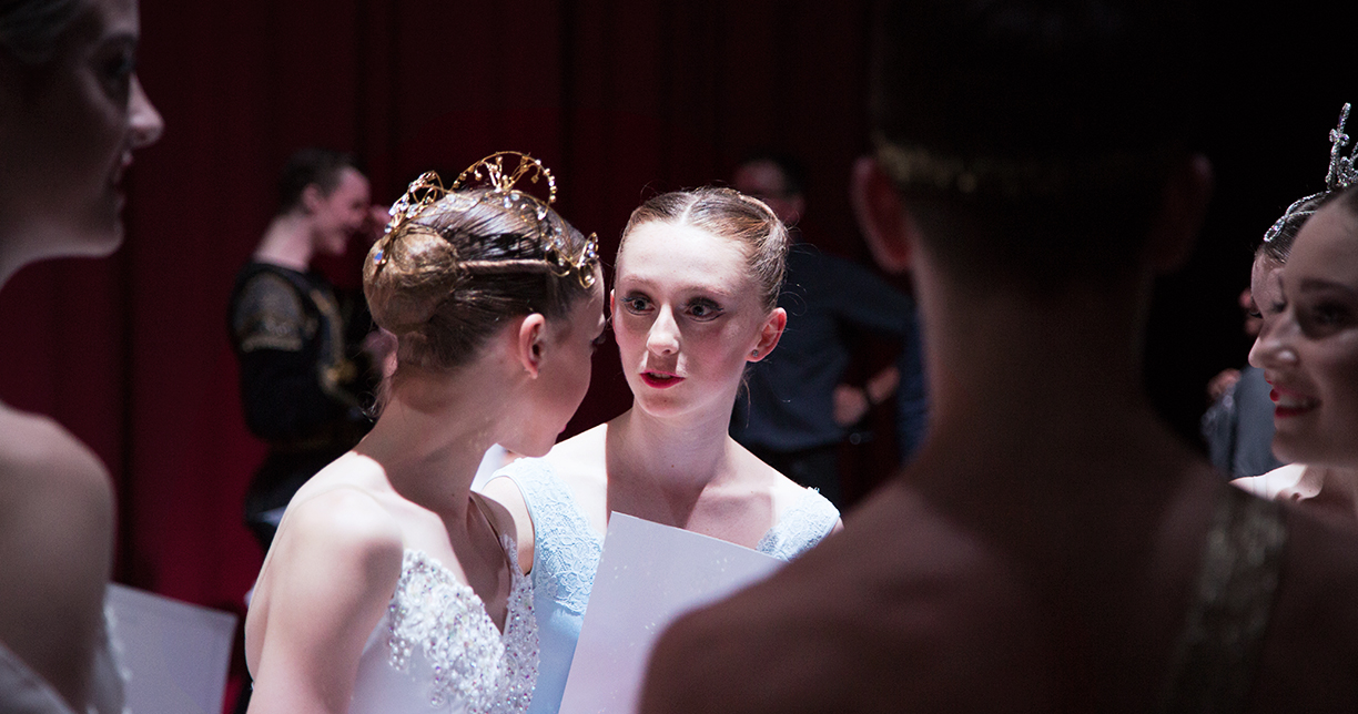 Genée 2016 Gold Medalist Maeve Nolan shares a moment with a fellow competitor during the day.