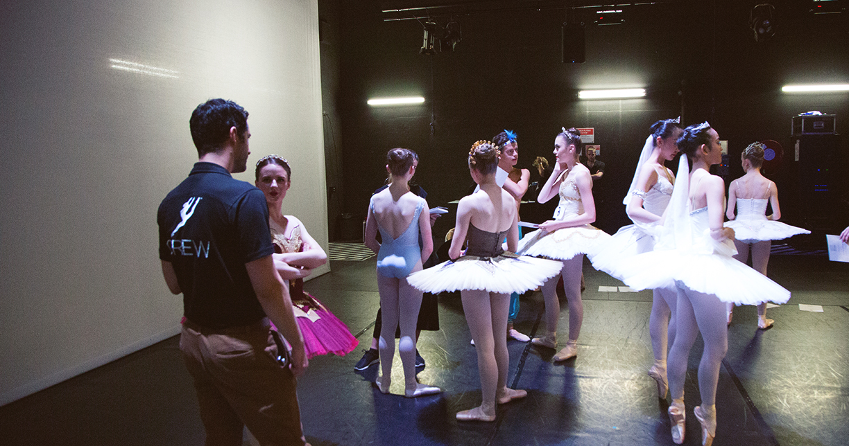 David Williams talking backstage to some of the Genée's young candidates.