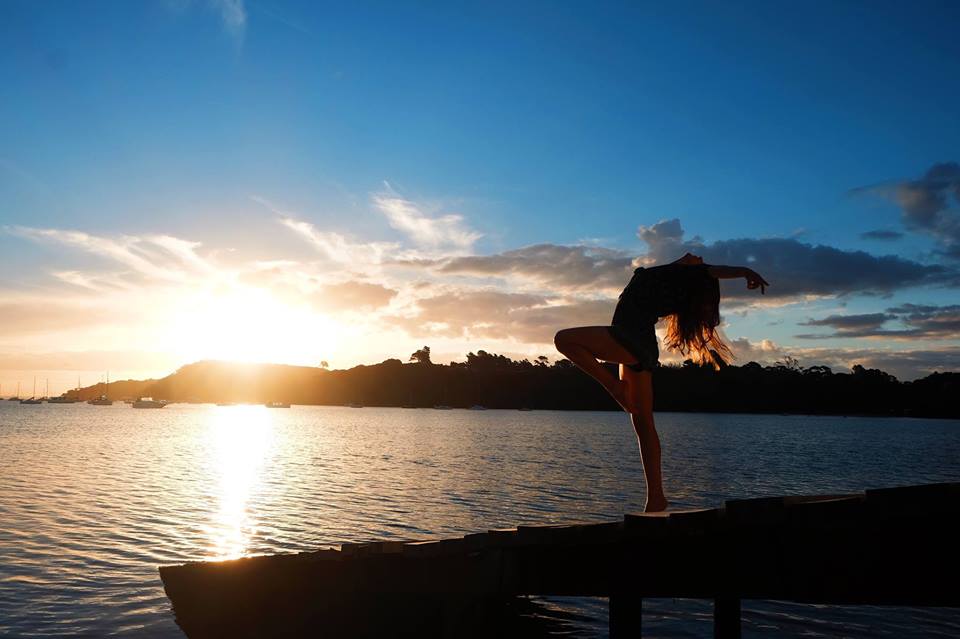 LEAOD Student Tara Lewis-Beolens in front of a typical Waiheke sunset
