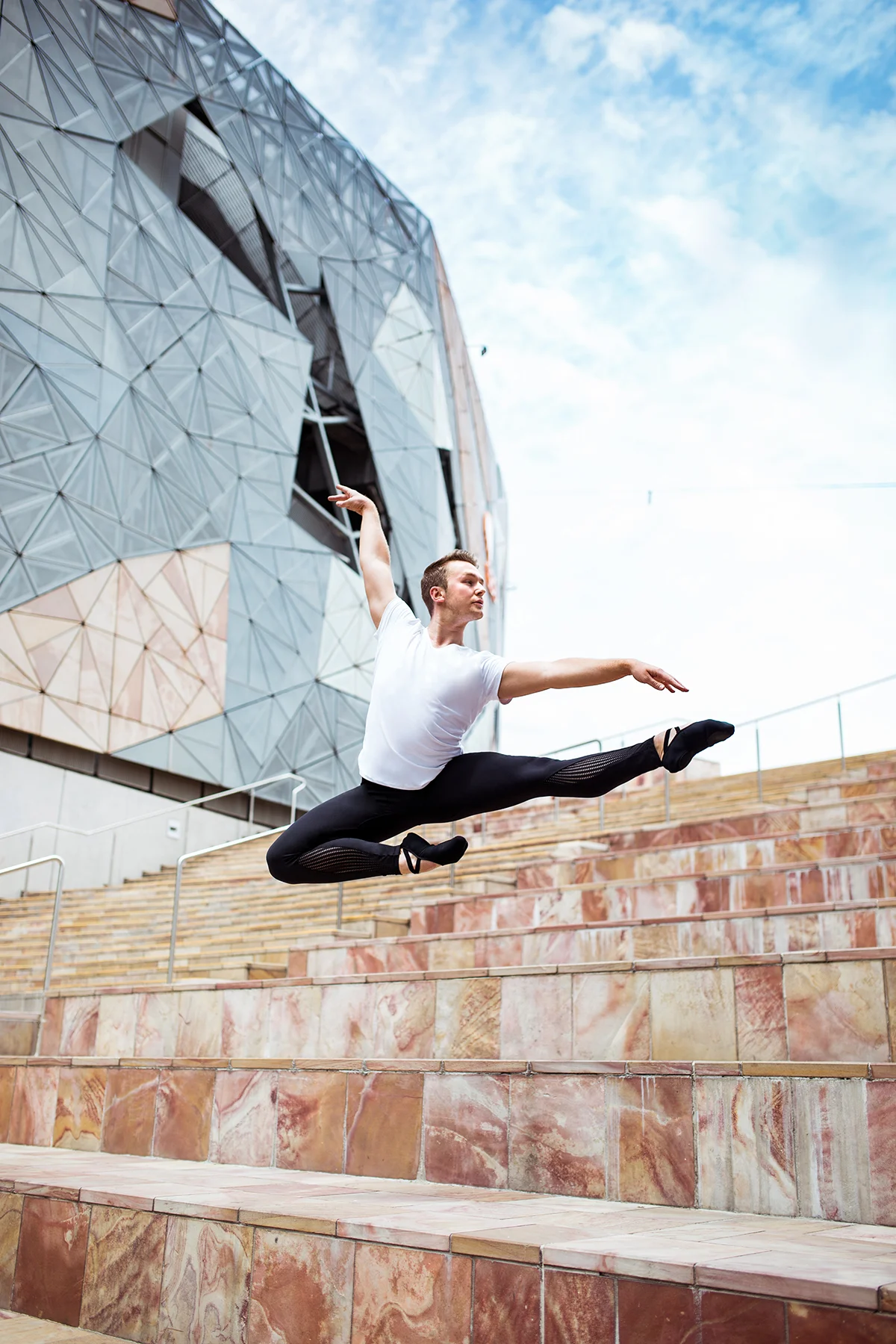 Jake wears the Men's T in White with the Men's Pro Ballet Legging - coming soon!