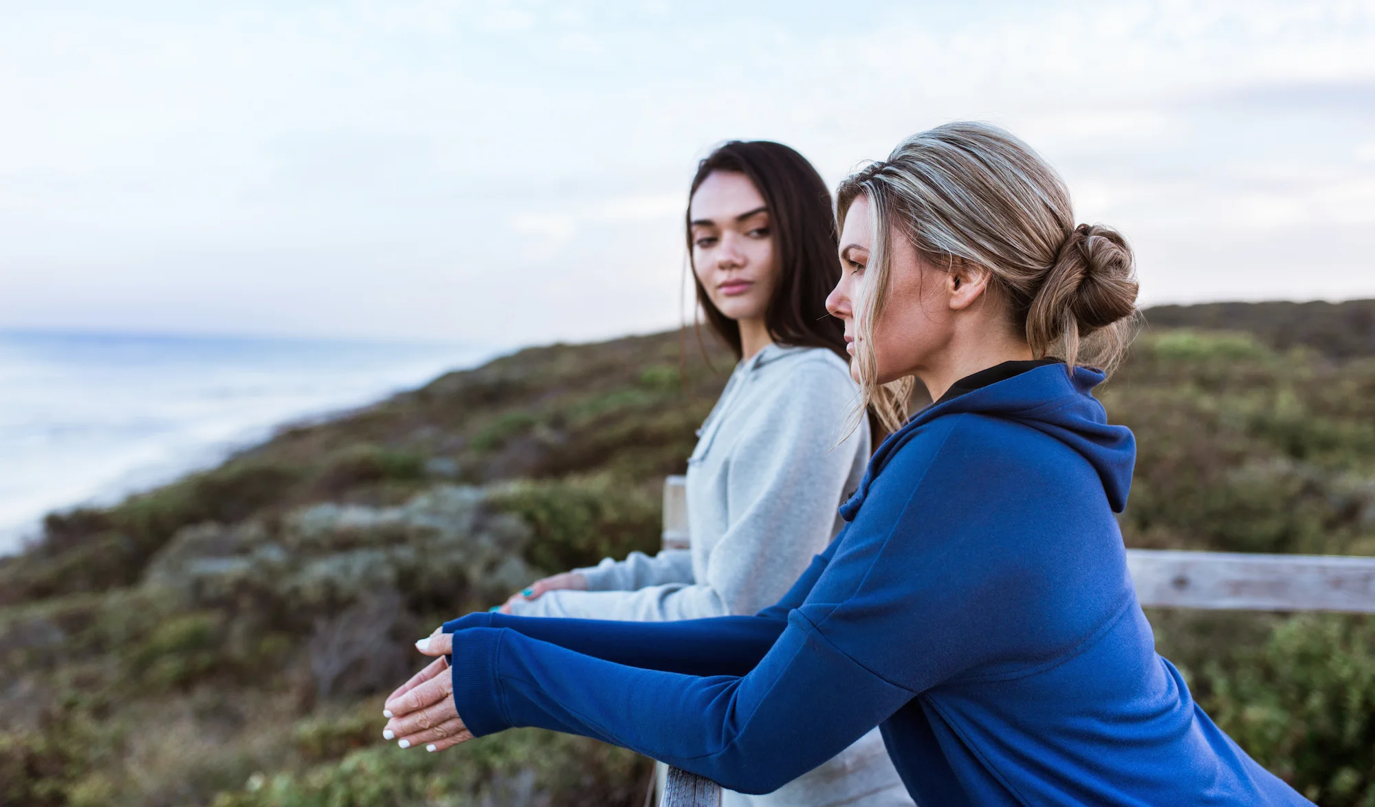 Sophie and Portia wear the Jordan Jacket in Midnight Blue and Delta Hoodie in Grey Marle