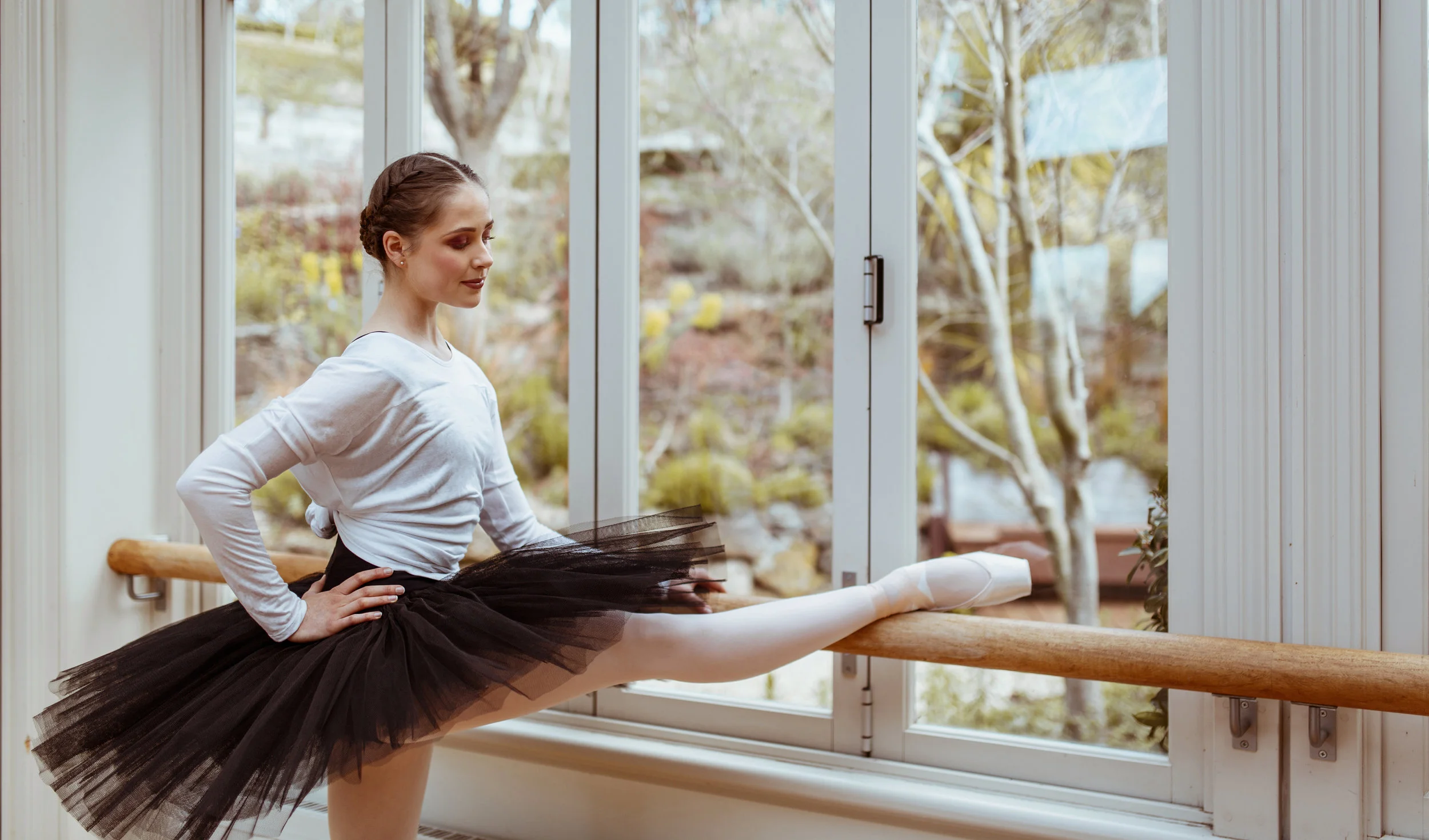 Alex wears the Ingrid Pullover , Mila Mesh Leotard and Darcey Half Tutu