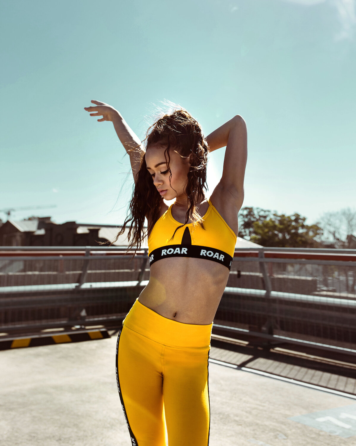  Mackenzie wears the Sloane Crop Top and Raven Track Tight 