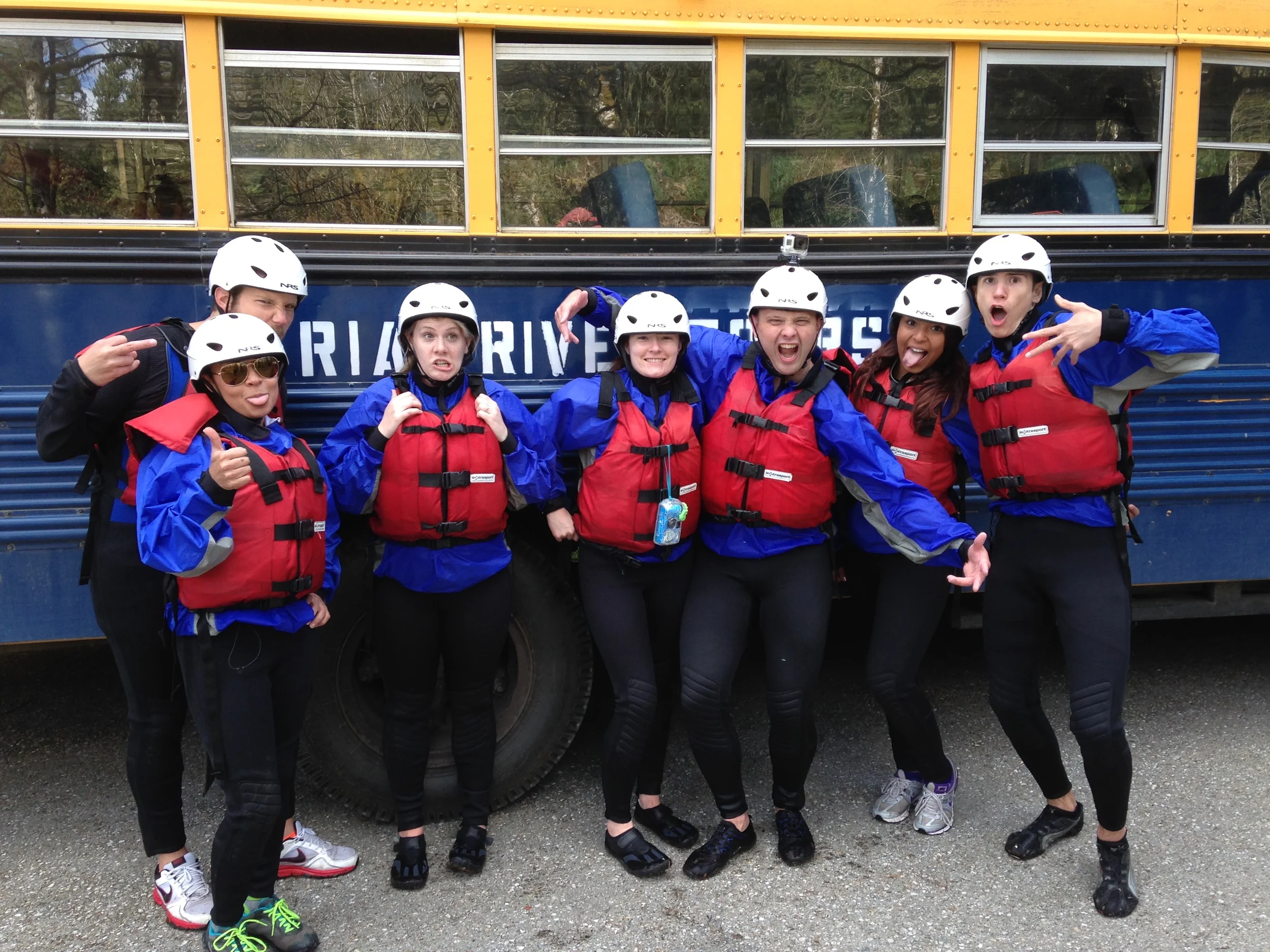 A group of rafters are picked up by the bus after a successful run down the Sauk River