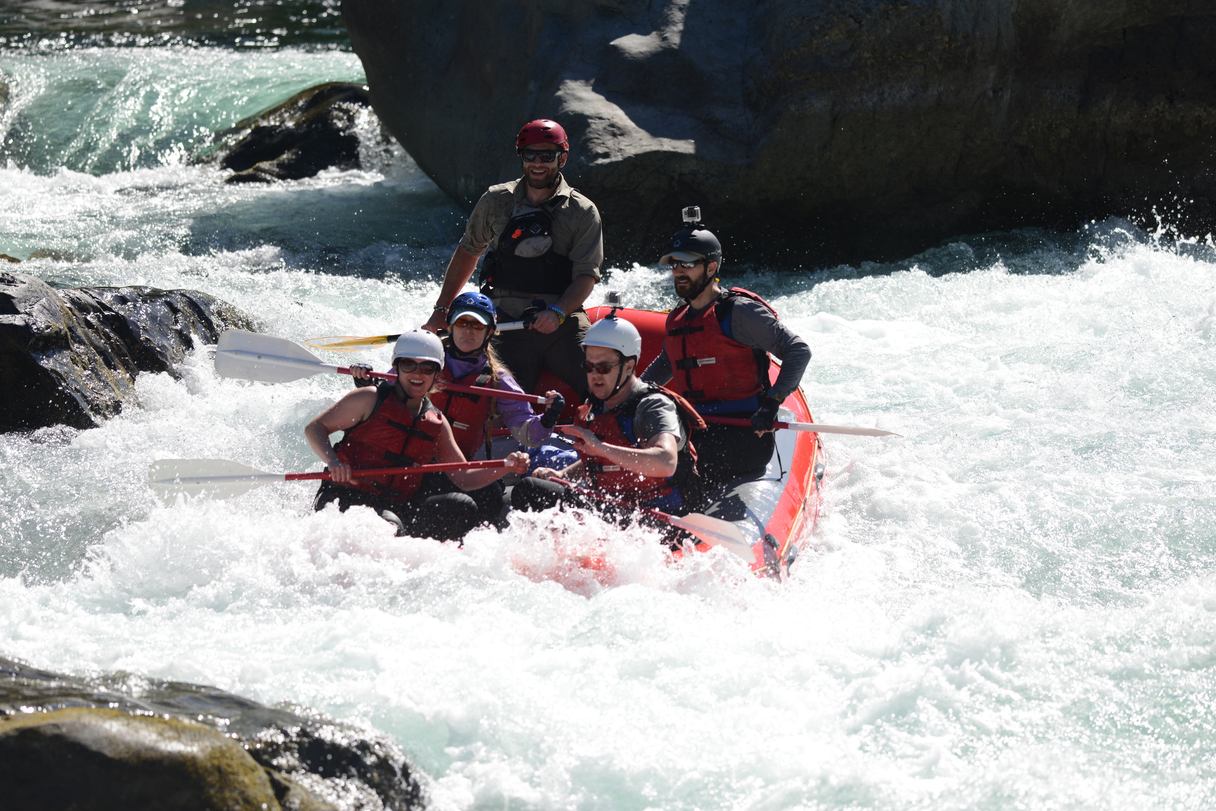 Brandon Steele (lead guide) navigating Boulder Drop successfully at very low water. note: skykomish river.