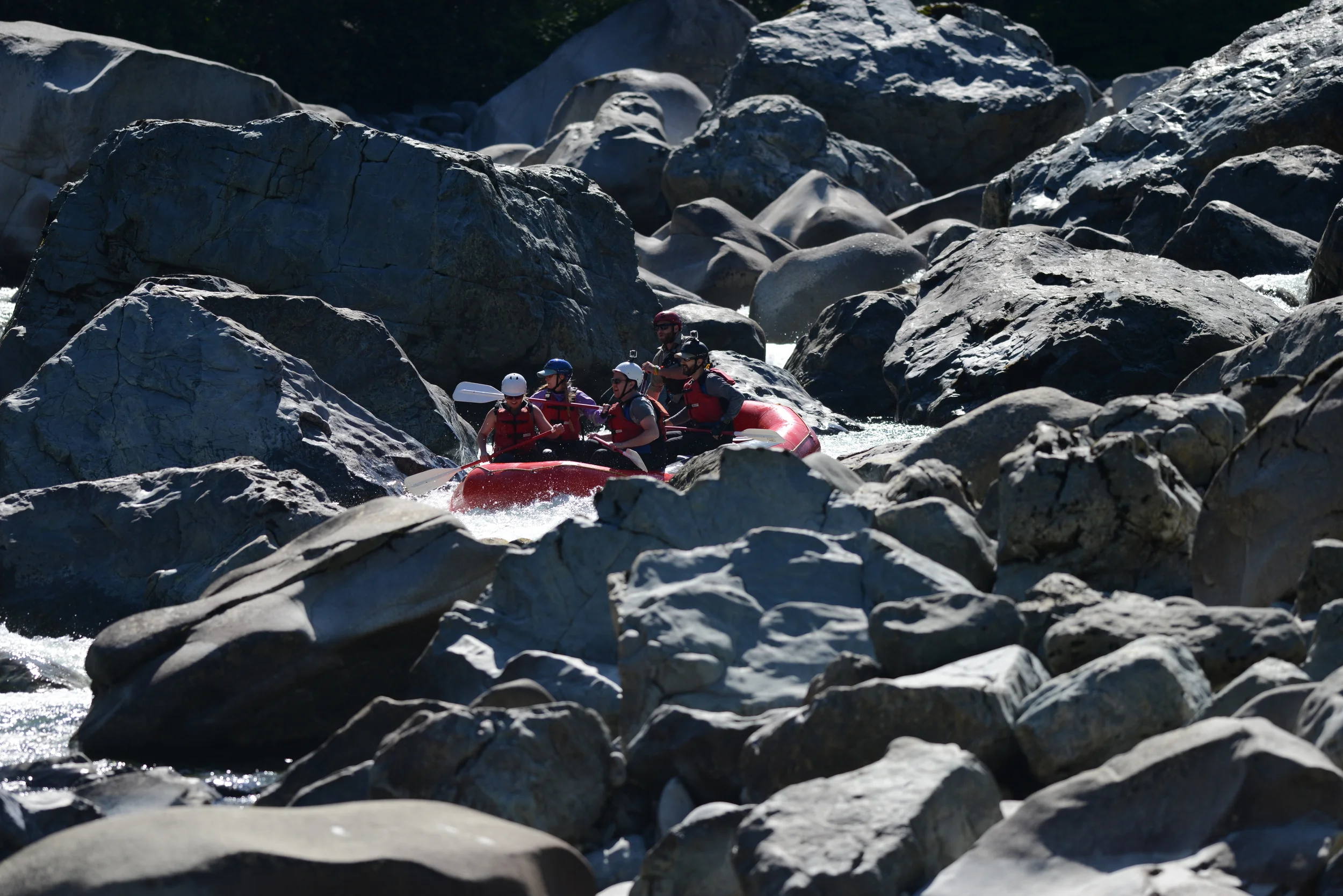 Lead guide Brandon Steele navigating "Boulder Drop" on the Skykomish River at low water flows... exemplifying why the rapid bears such a name. Great skill is required for low water technical boating, but the trip itself may not be as thrilling for some of our guests, who are looking for "going big"... unfortunately 2015 is just not the year for shredding the gnar on the Skykomish River.