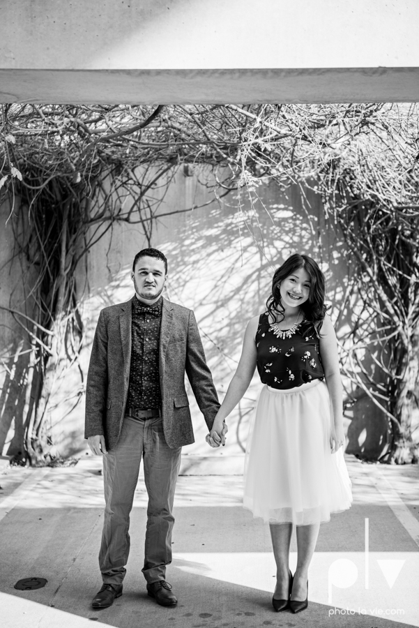 Mabel Hector engagement session Fort Worth Texas The Modern Art Museum The Kimbell kahn ando piano hot pink couple engaged ring shot texture winter architecture modern Sarah Whittaker Photo La Vie-1.JPG
