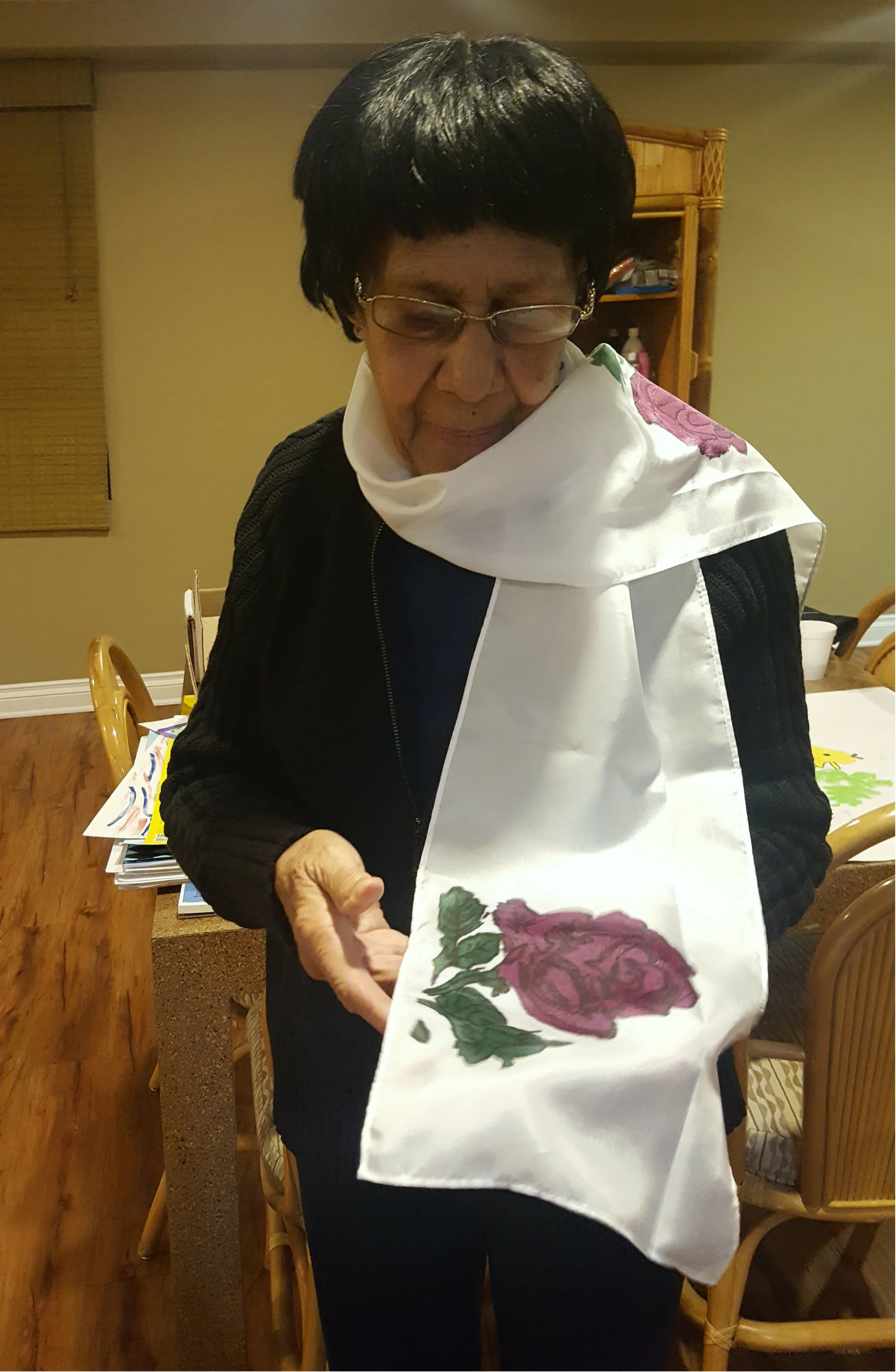 Beautiful ms. Rose renders a beautiful rose on her silk scarf