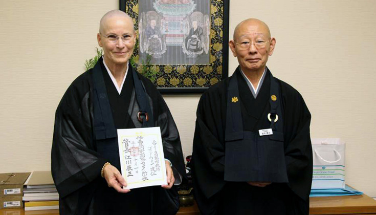 Konjin Gaelyn Godwin Roshi receiving the appointment as the new Director of the Soto Zen Buddhism International Center at Sotoshu Shumucho in Japan. Photo via Soto Zen Buddhism International Center on Facebook .